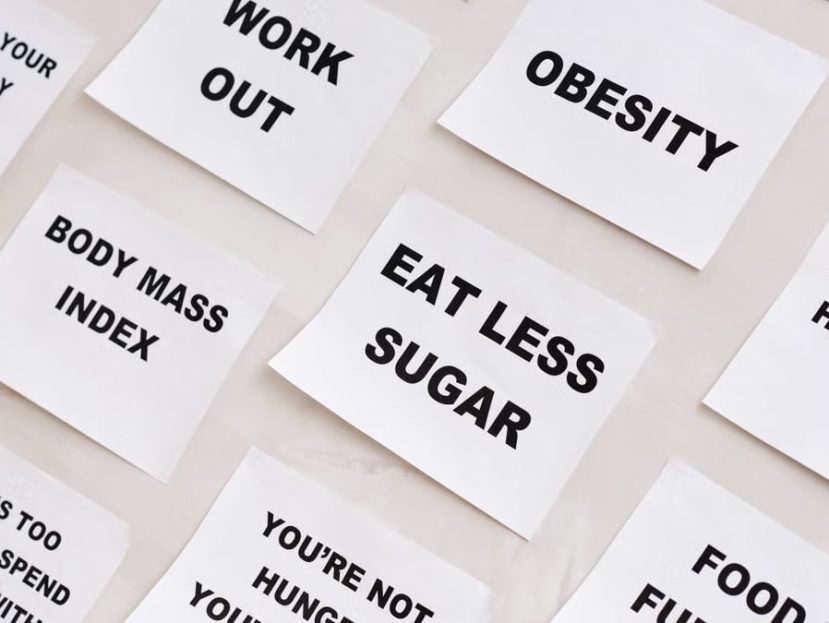 Collection of motivational notes promoting health and wellness found on paper notes.